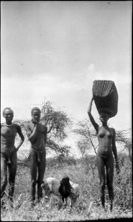 Nuer woman carrying basket