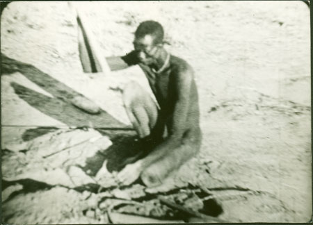 Dinka man with animal trap