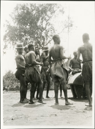 Zande men with drum and gong
