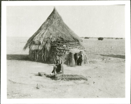 Nuer hut and mat-weaving