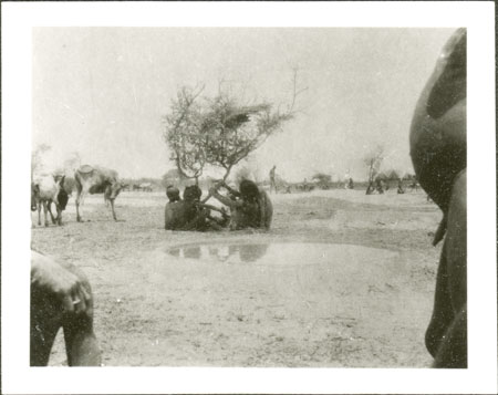 Nuer youths at water hole