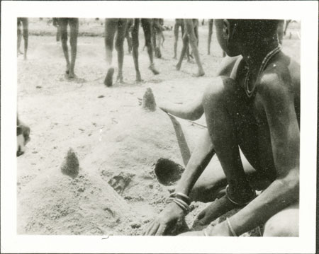 Nuer children making sand byres