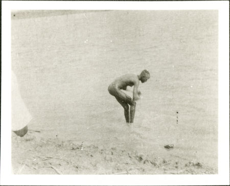 Nuer woman bathing