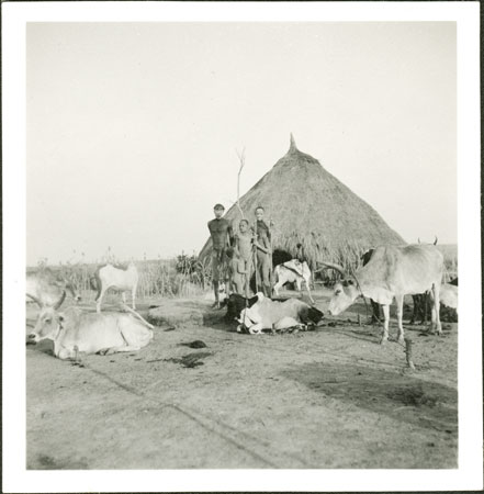Nuer homestead and family