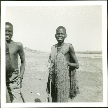 Shilluk youth with fishing net