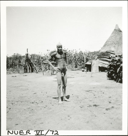 Nuer man in homestead