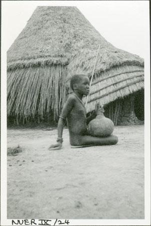 Nuer girl with gourd