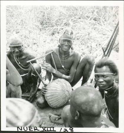 Nuer youths with harp