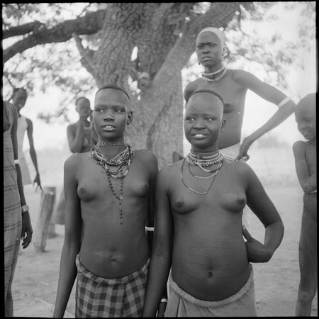 Mandari girls wearing bead ornaments