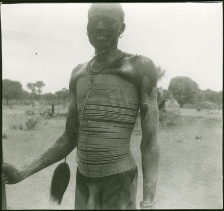 Mandari man wearing beads