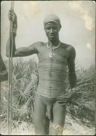 Mandari man wearing beads