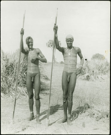 Two Mandari men wearing beads