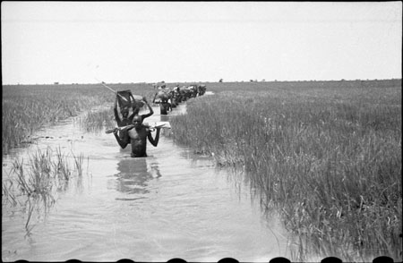 Nuer porters on march