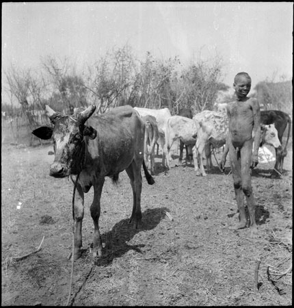 Dinka boy at cattle camp