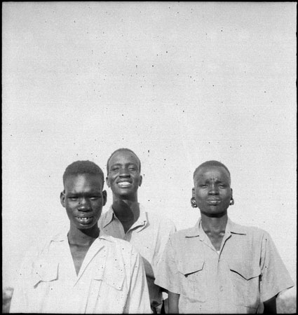 Portrait of three Dinka youths