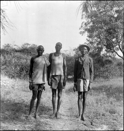 Portrait of three Dinka men