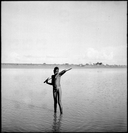 Dinka youth in shallows