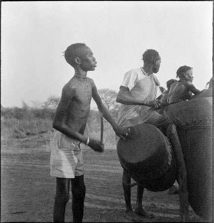 Dinka youths drumming at dance