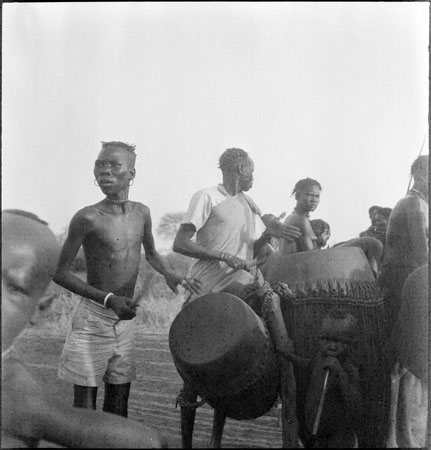 Dinka youths drumming at dance