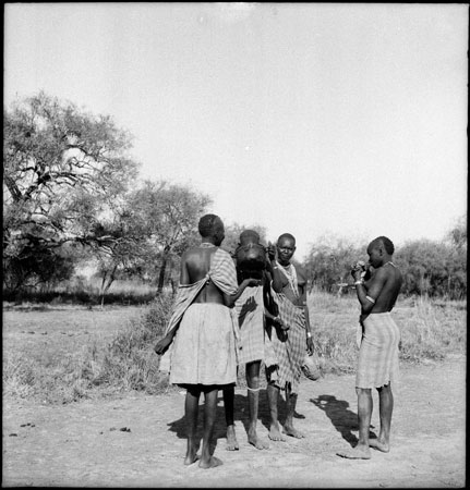 Group of Dinka women drinking 