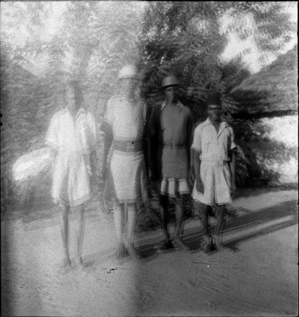 Portrait of four Dinka men