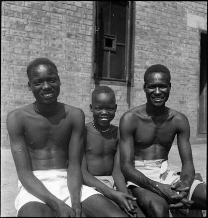 Portrait of three Dinka youths