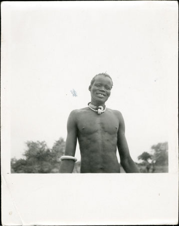 Dinka youth wearing beads