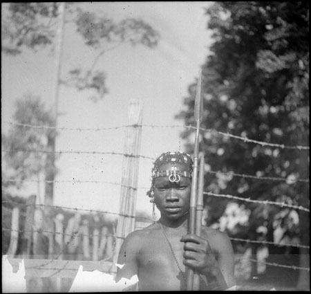 Youth with spear and beads
