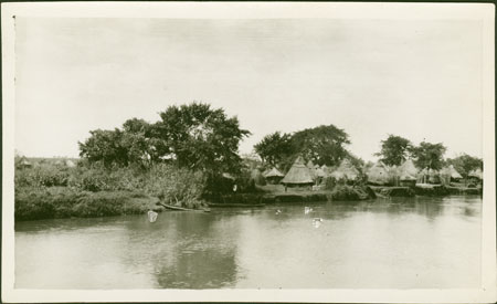 ?Anuak village on riverbank