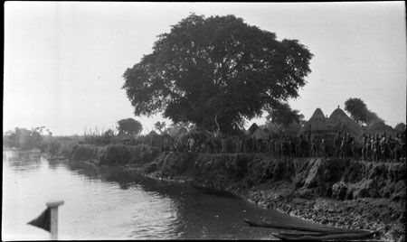 ?Anuak village on riverbank