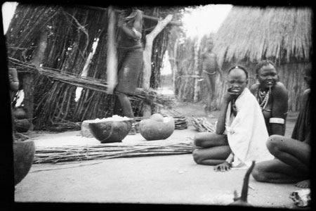 Nuer women in homestead