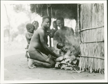 Ritual purifying of new Zande baby