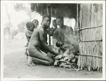 Ritual purifying of new Zande baby