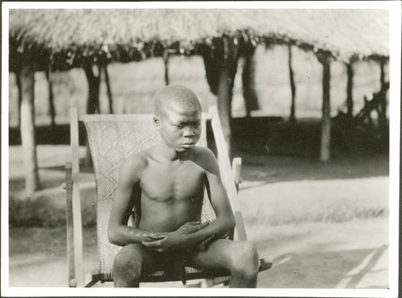 Zande boy in cane chair