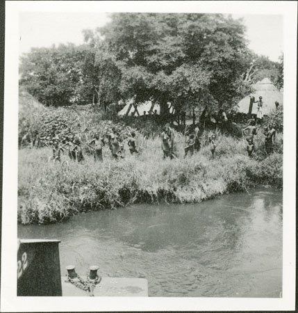 Anuak women on riverbank