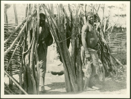 Ingessana men in homestead