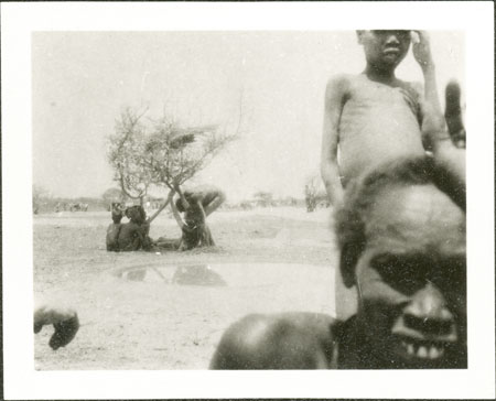 Nuer youths at water hole