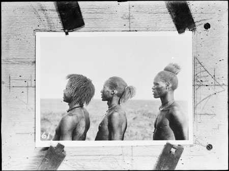 Portrait of three Nuer men