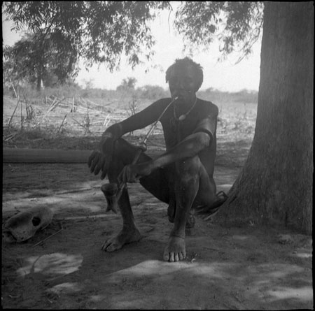 Mandari man smoking pipe