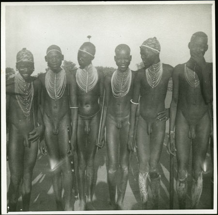 Mandari youths wearing bead ornaments