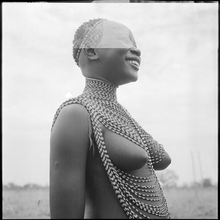 Mandari girl wearing bead ornaments