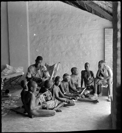 Buxton's Mandari minder with girls