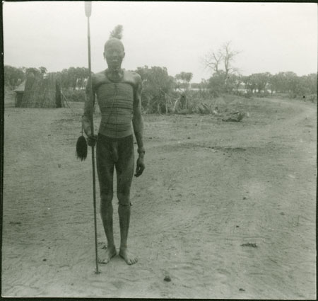 Mandari man wearing beads