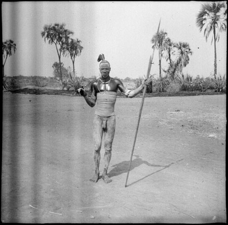 Mandari man wearing beads