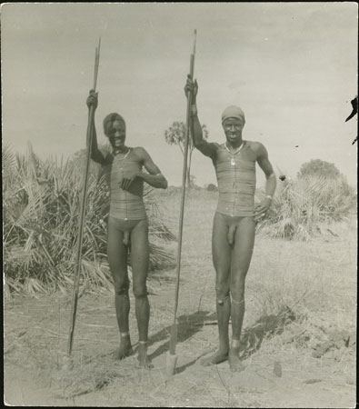 Two Mandari men wearing beads