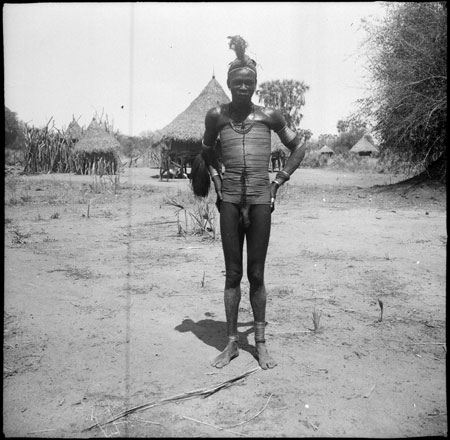 Mandari man wearing beads