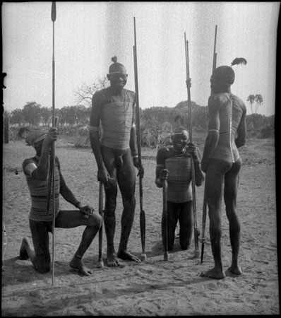 Mandari men wearing beads