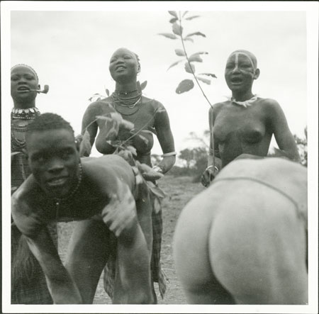 Mandari girls singing with switches 