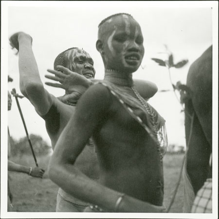 Mandari girl and youth dancing