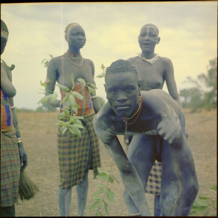 Mandari girls singing with switches 